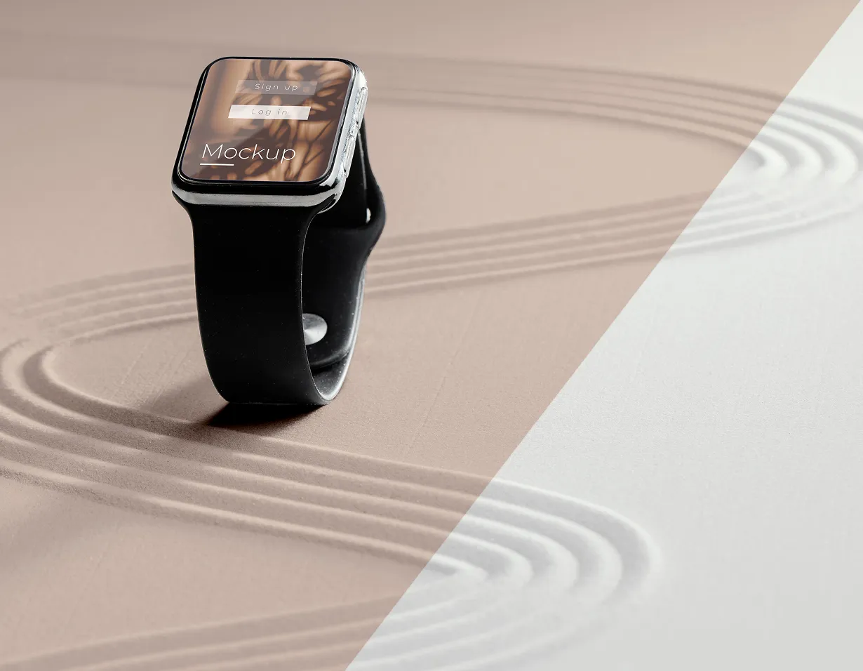 Black smartwatch on a beige surface showing its screen interface.